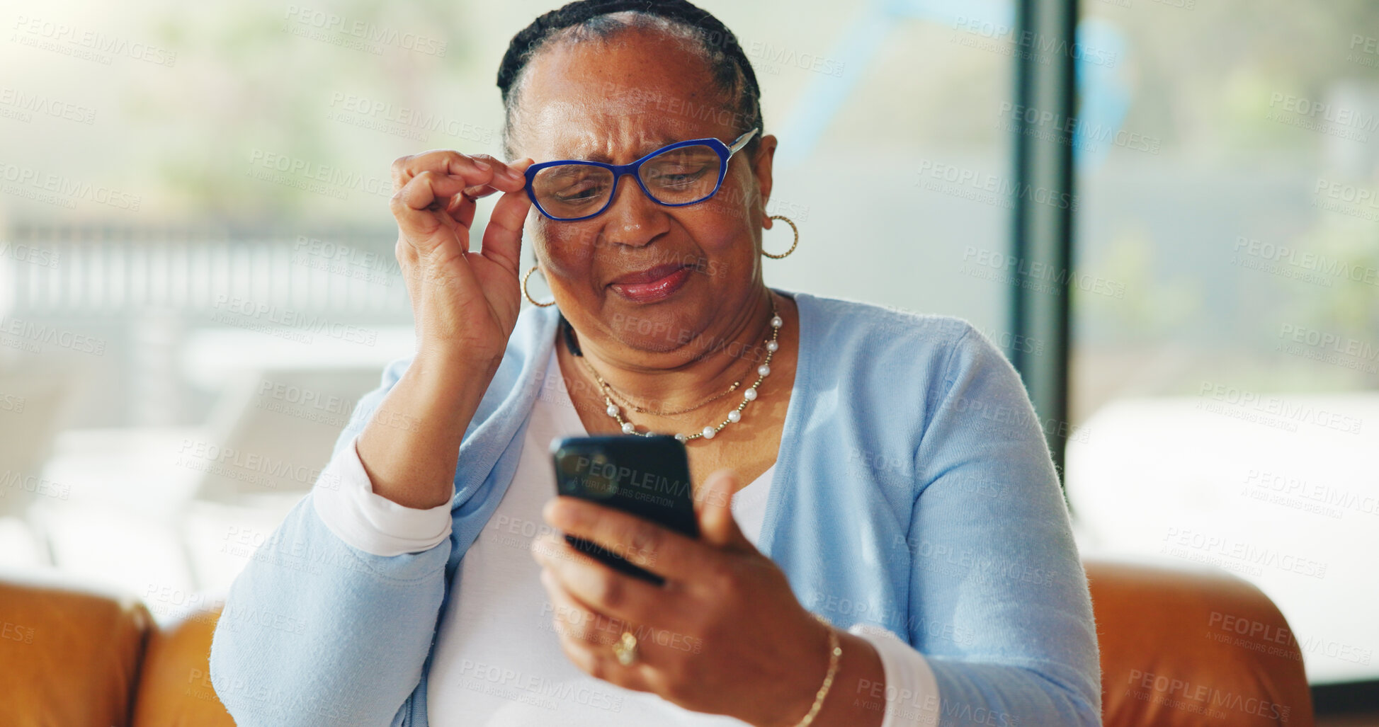 Buy stock photo Old woman, glasses and struggle with mobile reading, vision problem and small font size for difficulty. Upset, retirement or elderly person with poor eyesight to view phone, blurry text or aging eyes