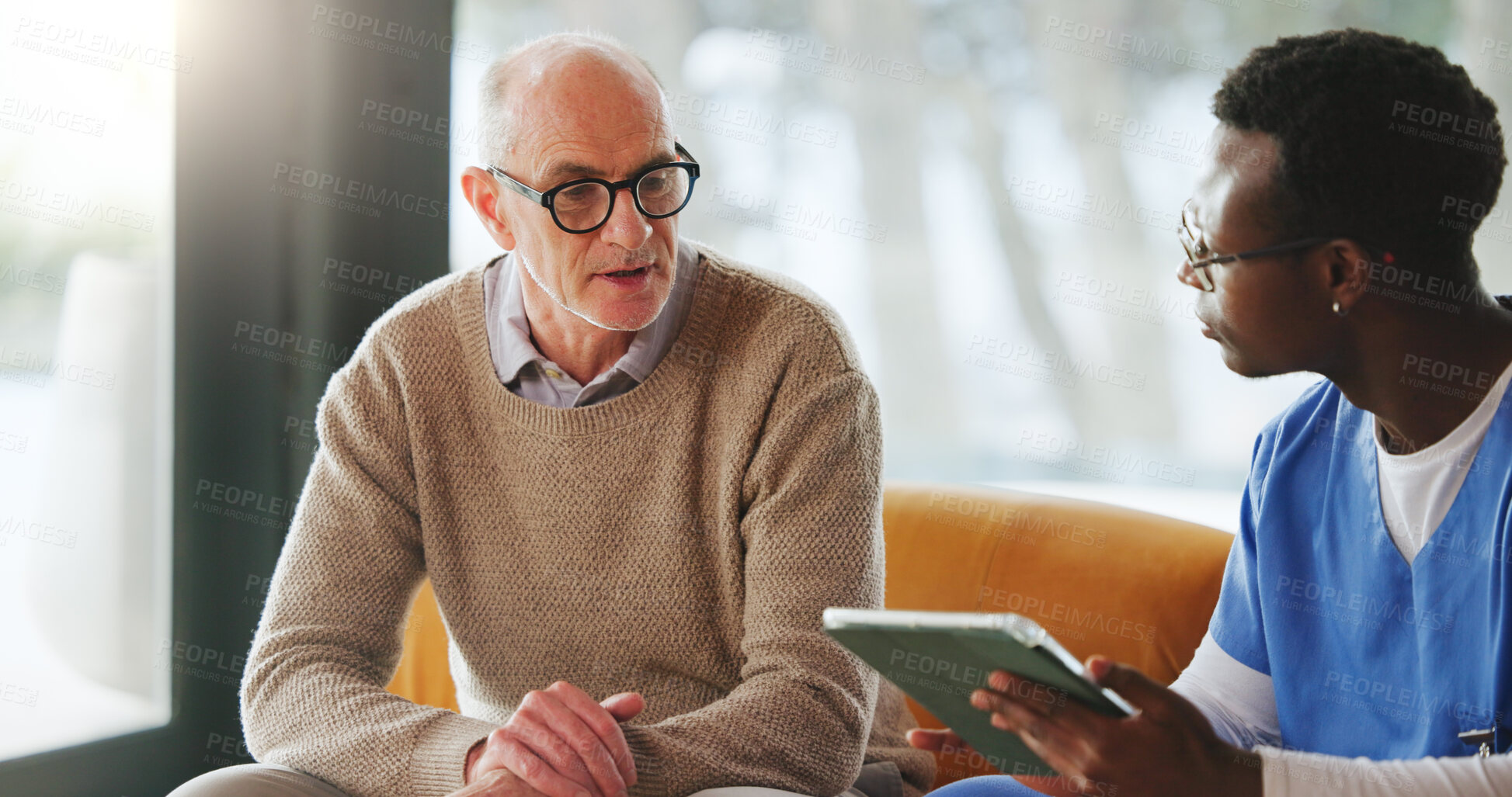 Buy stock photo Tablet, discussion and nurse with mature man on sofa in home for diagnosis, checkup or treatment plan. Digital technology, consultation and medical caregiver with patient in house for assisted living