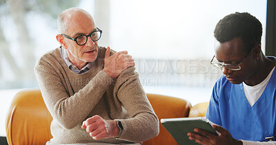 Buy stock photo Shoulder pain, old man and nurse with tablet in home for healthcare report, consulting or symptoms. Technology, caregiver or senior patient with injury, medical assessment or osteoarthritis diagnosis