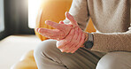 Senior person, massage and hand pain at house from arthritis, carpal tunnel and joint stiffness. Closeup, elderly man and muscle strain from osteoporosis, poor circulation and inflammation discomfort