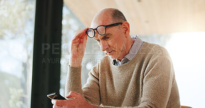 Buy stock photo Nursing home, glasses and senior man with smartphone, online and reading article with poor eyesight. Assisted living, eye strain and old person with wrong prescription eyewear, mobile and retirement