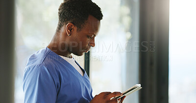 Buy stock photo Clinic, black man and nurse with tablet for reading email, research or telehealth report. Technology, serious person and medical worker with healthcare assessment, review results or wellness info