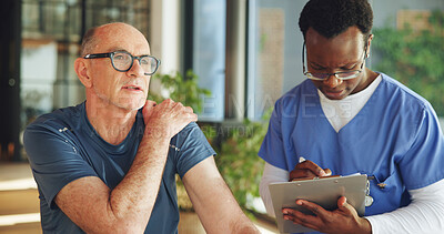 Buy stock photo Nurse, clipboard and shoulder pain with senior man in clinic for physiotherapy, healthcare or symptoms. Support, retirement and chiropractor with mature person, exam and report for healing advice