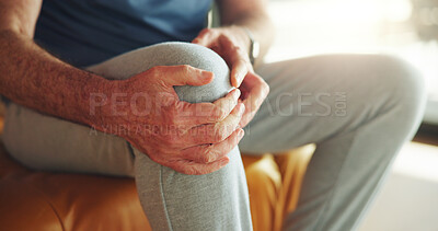 Buy stock photo Knee pain, tension and hands of man in home for fibromyalgia, emergency and pressure crisis. Joint inflammation, osteoarthritis and sprain with person in living room of apartment for cramp and injury