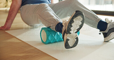 Buy stock photo Legs, stretching and man with foam roller, physical therapy and muscle recovery with wellness. Health facility, person and patient with exercise, mobility training or rehabilitation with healing