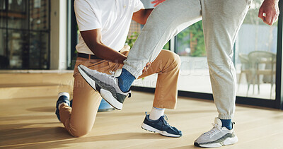 Buy stock photo Leg, rehabilitation and stretching with old man and physiotherapist for support, chiropractor and consulting. Help physical therapy and recovery with senior patient in clinic for healthcare
