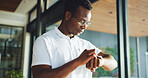 Black man, fitness and check smart watch in home for performance stats, workout results or heartbeat. Wristwatch, athlete and person in house with timer for exercise info, monitor health and wellness