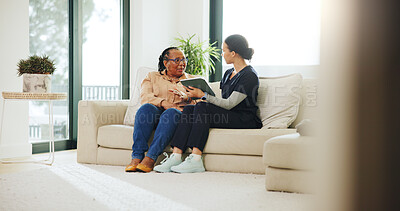 Buy stock photo Advice, assisted living or tablet with nurse and old woman on sofa in home for insurance. App, consulting and healthcare with medical caregiver and senior patient in apartment for feedback or review