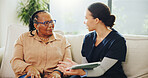Tablet, conversation and nurse with senior woman on sofa for research on diagnosis at home checkup. Happy, digital technology and medical caregiver with elderly female patient for treatment plan.