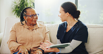 Buy stock photo Tablet, conversation and nurse with senior woman on sofa for research on diagnosis at home checkup. Happy, digital technology and medical caregiver with elderly female patient for treatment plan.