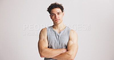 Buy stock photo Portrait, man and bodybuilder with arms crossed in studio for fitness, exercise pride or healthy body. Mockup space, person and confidence for training, strong muscles and flexing on white background