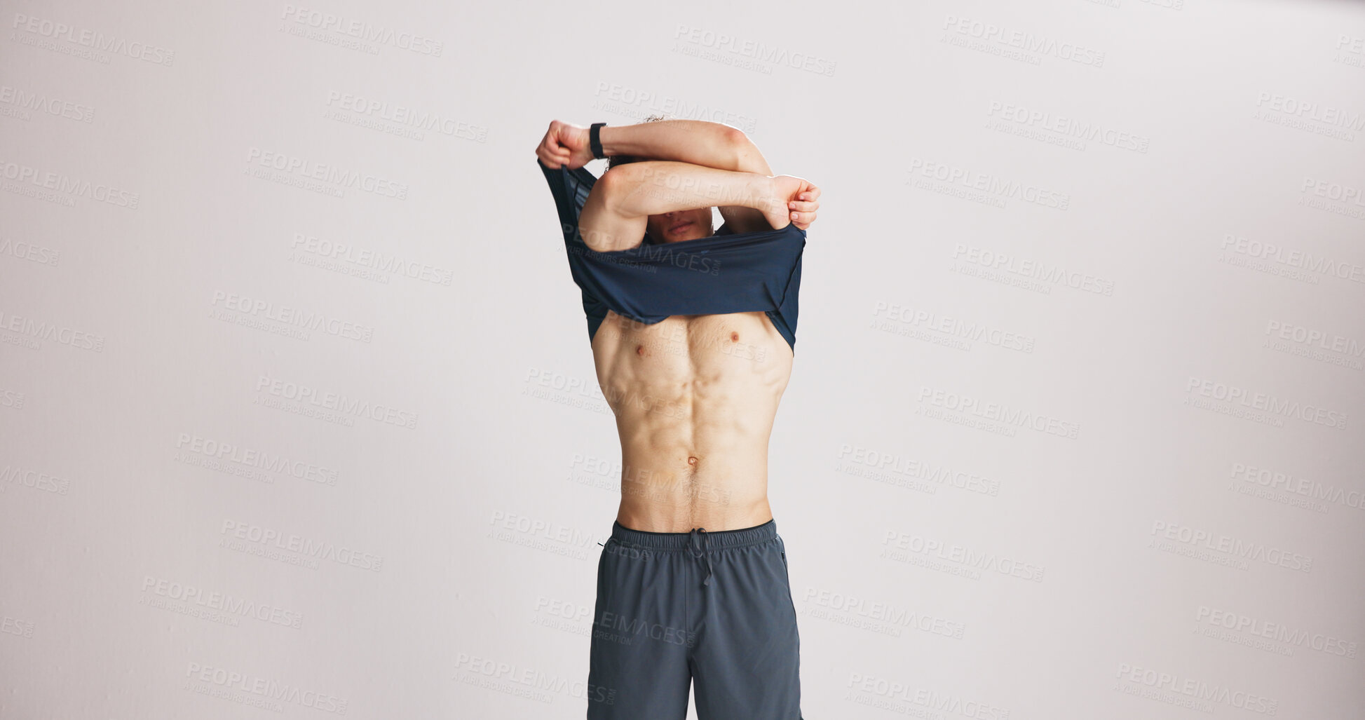 Buy stock photo Fitness, remove tshirt and six pack with man on studio space for training results. Abs, health and wellness with body of athlete person on white background mockup to take off clothes or undress