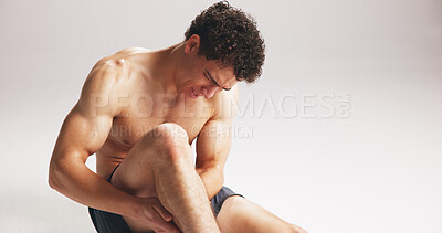 Buy stock photo Fitness, leg pain or man in studio with massage, training accident or emergency in muscle tension. Hurt, sore or athlete on white background with injury, calf or joint strain in workout issue.