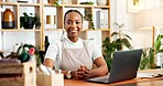 Portrait, happy and black woman in office with laptop for sustainable business, project and proposal. Person, smile and confidence with computer for ESG compliance, eco friendly company and about us.