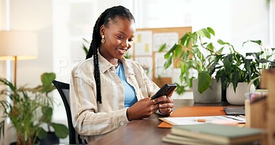 Buy stock photo Business, phone and typing with black woman in plant nursery for social media or text message communication. App, contact and mobile with happy African florist at desk in workplace for email feedback