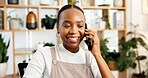 Phone call, smile or black woman in office with plant, client chat or negotiation on sustainable material. Happy, networking or eco consultant in agency with tech, outreach or discussion on ESG goal.