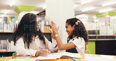 Buy stock photo High five, education and teacher with child in library for studying, learning or tutoring at school. Happy, book and educator with girl student for celebration with correct answer at academy. 