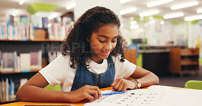 Buy stock photo Homework, kid and girl in library, studying and education with knowledge, paper and growth. Student, learning and child development with progress, smile and prepare for exams, assessment and notes