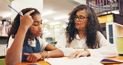 Buy stock photo Tutor, child and counting with books in library with maths evaluation, numeracy and problem solving. Teacher, student and education with help for assessment, learning support or study assistance