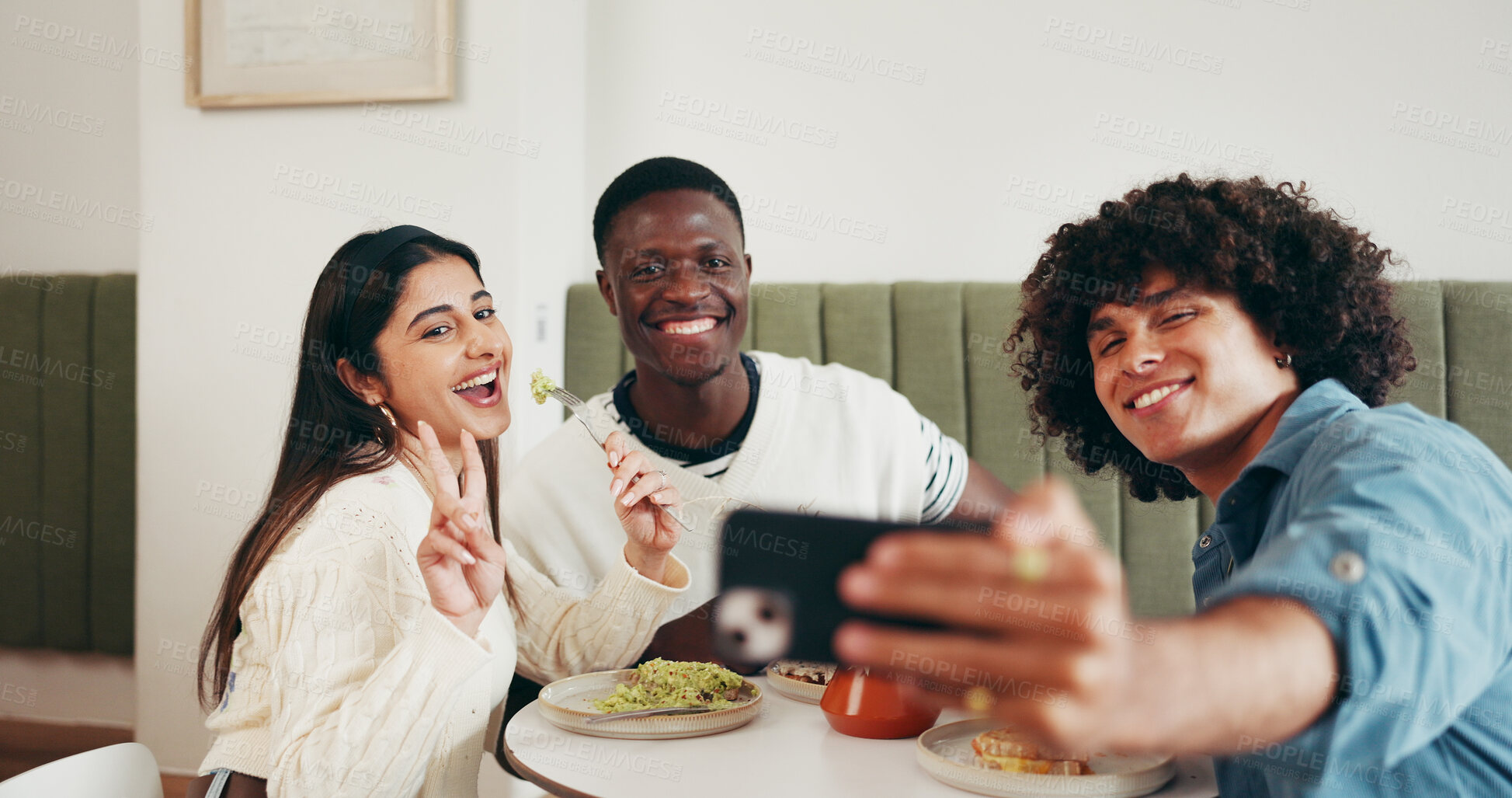 Buy stock photo Restaurant, happy and selfie of friends with peace sign for social media, memory and online post. Hangout, cafe and men with woman take photo, picture and emoji for bonding, relax and meal together