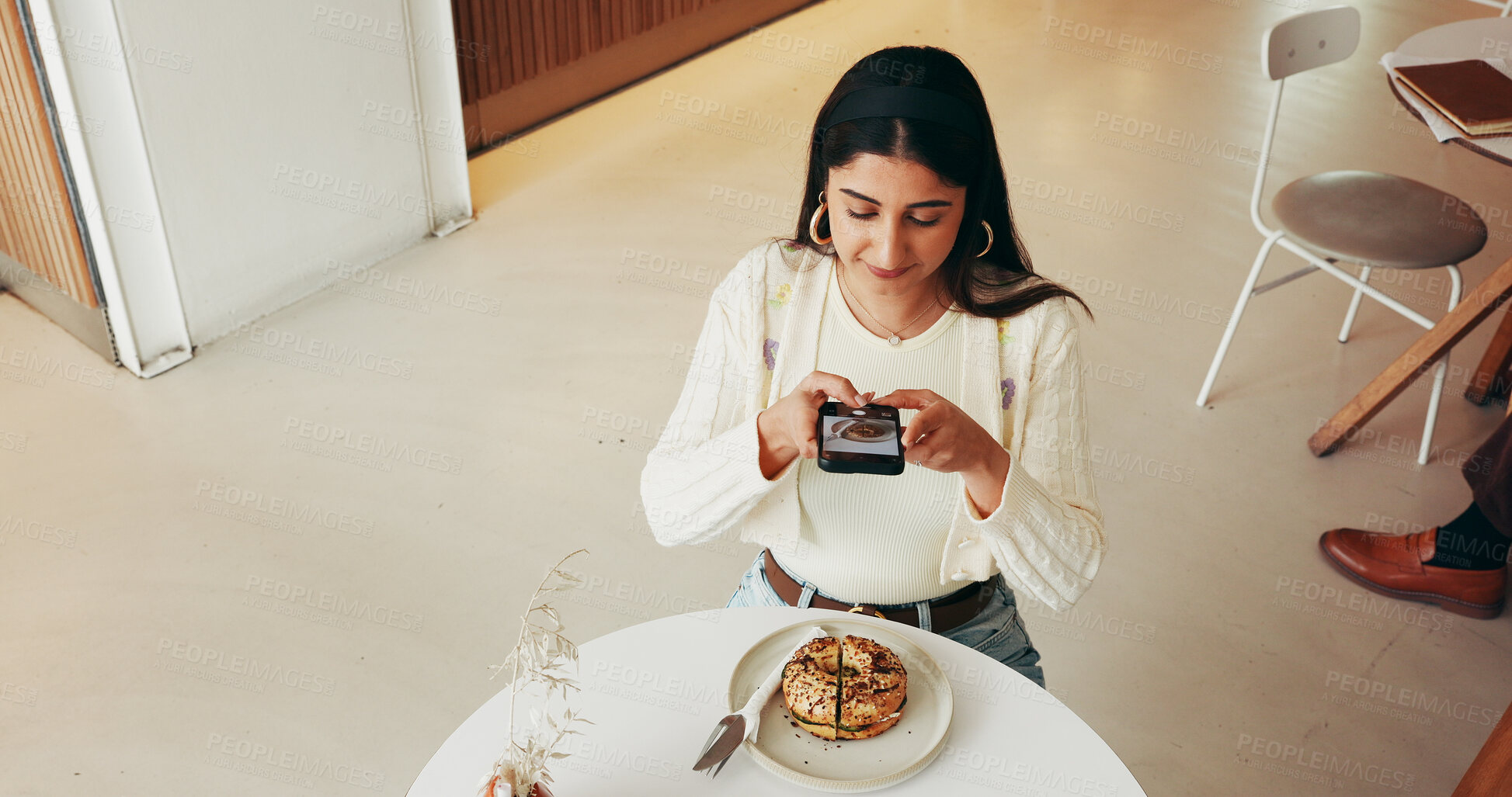 Buy stock photo Above, dessert or woman in cafe for social media, meal review or post update on restaurant service. Hospitality, cake image or blogger in coffee shop with phone, digital or content creation on app.