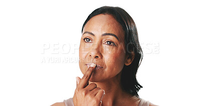 Buy stock photo Thinking, lip scrub and mature woman in studio for skincare, exfoliation and hydration for grooming. Mockup space, white background and person apply cosmetics for beauty, anti aging and circulation
