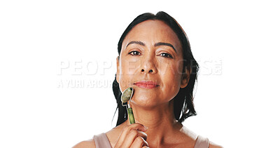 Buy stock photo Face roller, skincare and woman in studio, beauty and dermatology on white background. Mockup space, cosmetic product and mature person with treatment, routine and wellness with portrait and tools