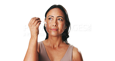 Buy stock photo Woman, skincare serum and dropper in studio with glow, application and mockup space on white background. Mature person, beauty and dermatology with essential oil, liquid and hydration for anti aging