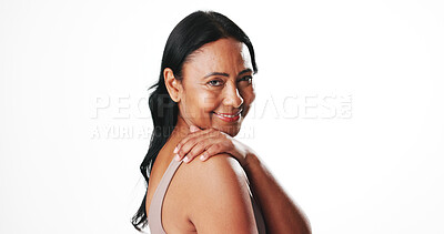 Buy stock photo Portrait, confident and woman with smile, skincare or glow with self care, wellness and mockup space. White background, studio and mature person with healthy skin, cosmetics and dermatology in Mexico