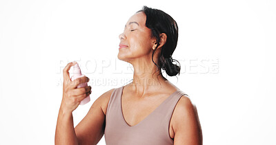 Buy stock photo Studio, beauty and woman with facial spray, mockup space and setting makeup with hydration and glow. White background, cosmetics and mature person with product for makeover and self care with liquid