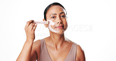 Buy stock photo Face mask, skincare and portrait of woman in studio for clay facial, pore detox cosmetics and beauty treatment. Anti aging, dermatology and self care with mature person on white background for spa