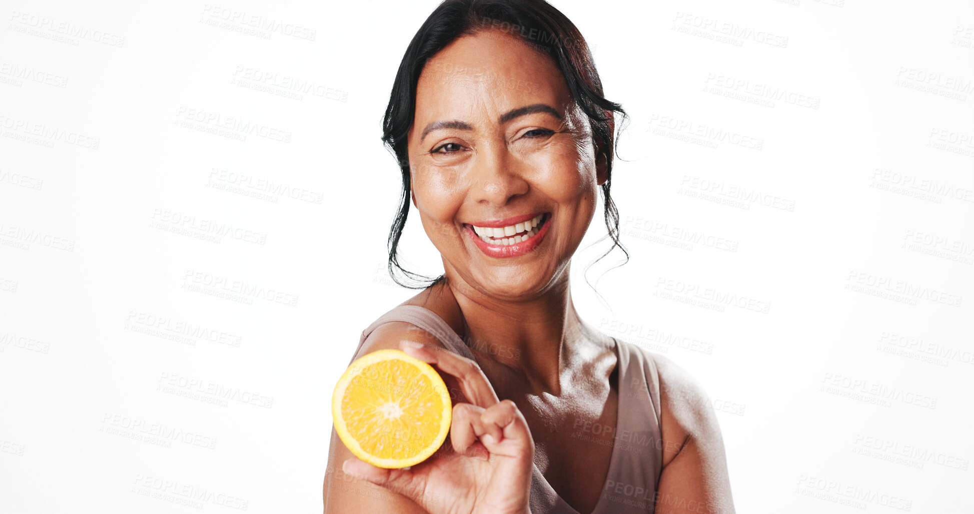 Buy stock photo Portrait, skincare and woman with orange, glow and facial treatment with vitamin c and mockup space. White background, natural cosmetics and mature person with fruit, anti aging benefits and studio