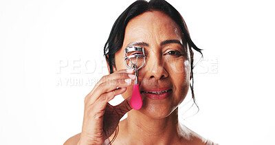 Buy stock photo Lashes, curler and portrait with woman in studio for volume, beauty and makeup tool. Eyelash extensions, mascara prep and self care with mature person on white background for cosmetics and salon