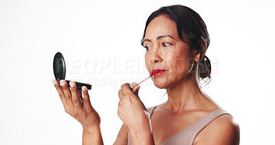 Buy stock photo Woman, lipstick and mirror in studio for beauty, makeup and mock up space on white background. Mature person, cosmetics and product with tools, lip gloss and application for mouth with cosmetology