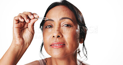 Buy stock photo Mature woman, portrait and eyebrows with tweezer for hair removal on a white studio background. Female person, model or plucking with beauty tool for epilation, grooming or facial treatment on space