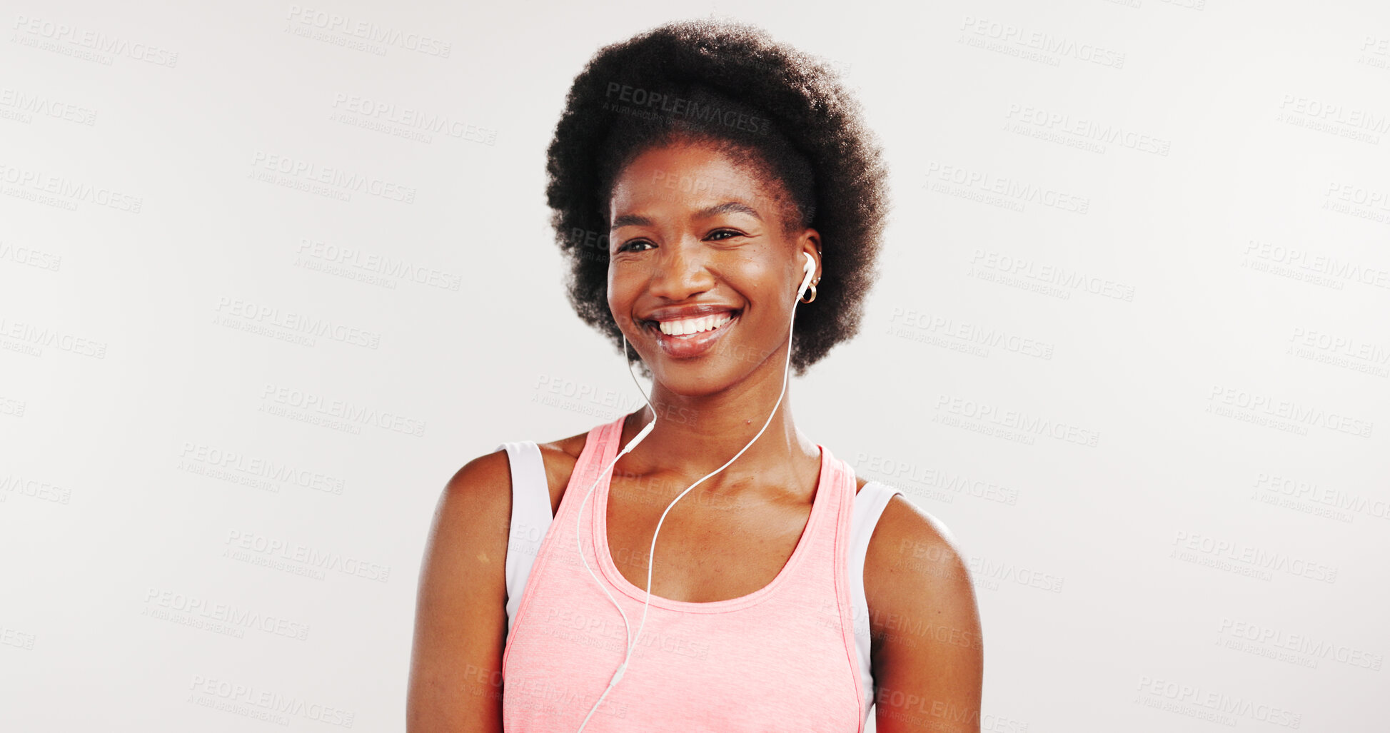 Buy stock photo Music, fitness and smile with black woman in studio for streaming service, workout playlist and health. Radio subscription, exercise podcast and earphones with person on white background for audio