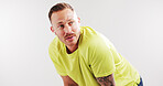 Tired, exercise and man in studio thinking for recovery from fitness, training and workout. Mockup space, athlete and person with sweat, fatigue and idea for wellness or health on white background