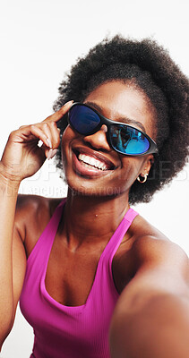 Buy stock photo Selfie, glasses and fitness with black woman in studio for smile, gym membership promotion and style. Profile picture, personal trainer post pov and glare protection with person on white background