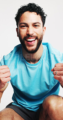 Buy stock photo Man, fitness and fist pump in studio portrait, smile and excited for goals with pride on white background. Person, athlete and happy with success, achievement and confidence for training in Colombia