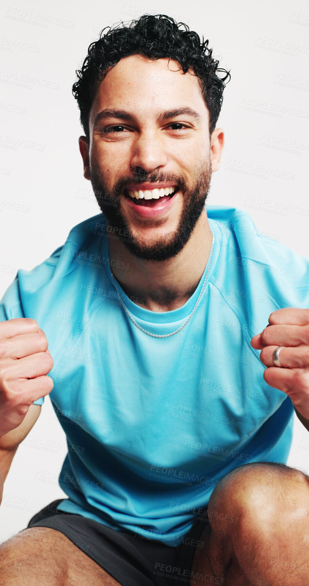 Buy stock photo Man, fitness and fist pump in studio portrait, smile and excited for goals with pride on white background. Person, athlete and happy with success, achievement and confidence for training in Colombia
