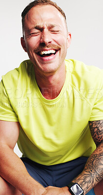 Buy stock photo Happy, fitness and man in studio laughing with confidence for exercise, training and workout. Mockup space, athlete and person with funny joke for wellness, pride and health on white background