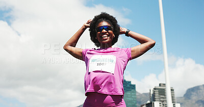 Buy stock photo Happy, black woman or fitness with sunglasses in city for marathon, sports run or outdoor race. Below, female person or athletic runner with smile for summer challenge, sprint or competition in town