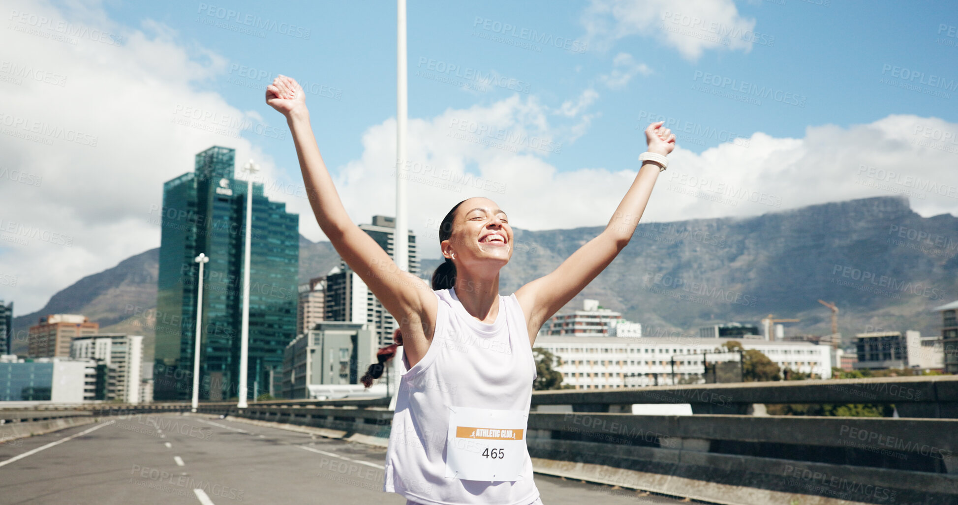 Buy stock photo Happy woman, runner and winning with marathon in city for fitness challenge, race or competition. Active, female person or winner with smile, number or fist pump for sport, sprint or victory in town