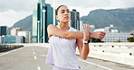Woman, fitness and stretching with arms in city for workout preparation or outdoor exercise. Active, female person or getting ready with body warm up for flexibility, physical activity or training