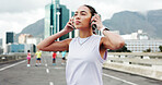 Headphones, runner and woman in city for exercise, marathon training and workout outdoor. Sports, athlete and person listening to music, audio and radio for wellness, health and fitness in urban town