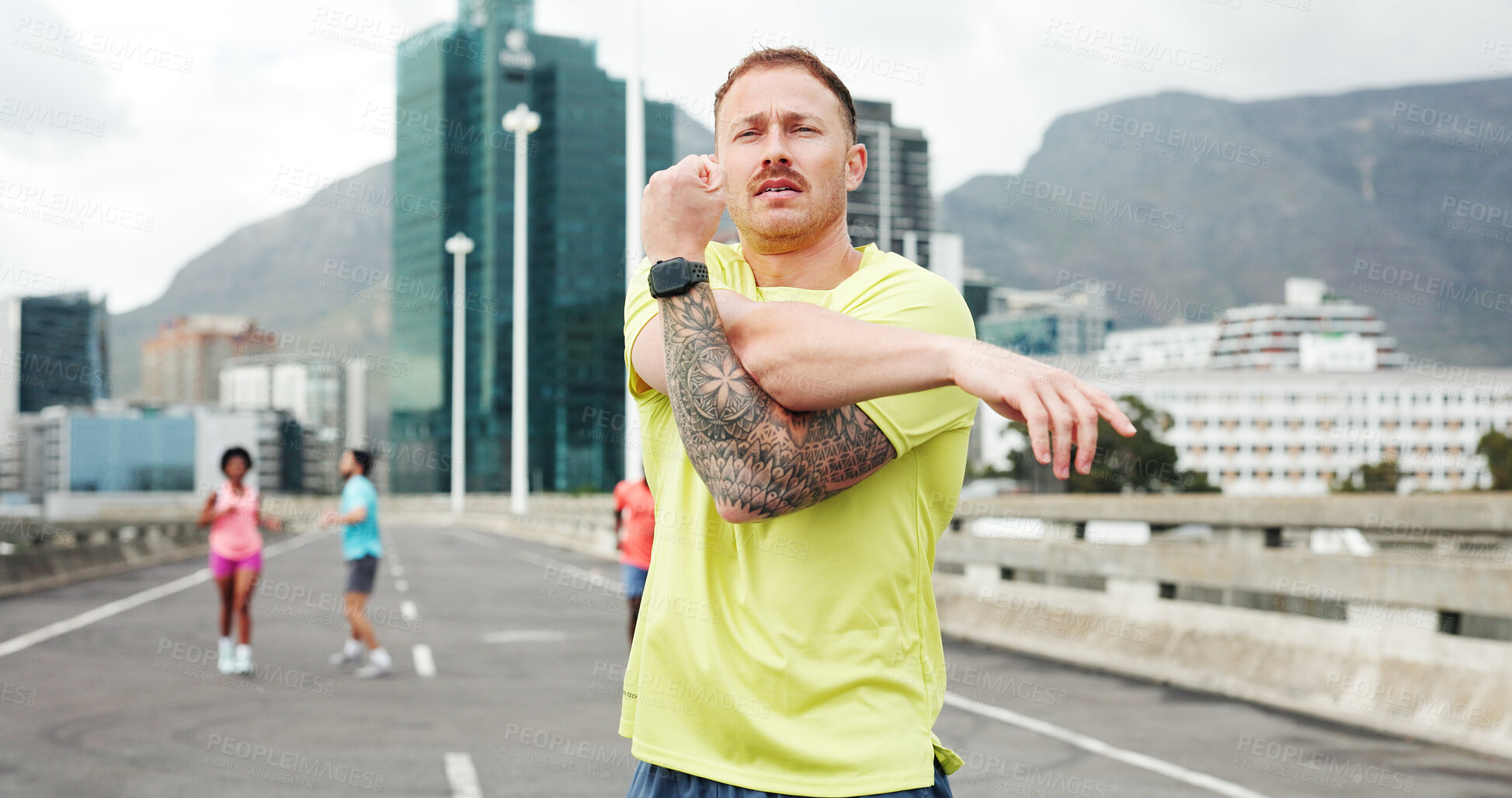Buy stock photo Man, fitness and stretching with arms for workout preparation or outdoor exercise in city. Active, male person or getting ready with body warm up for flexibility, physical activity or training