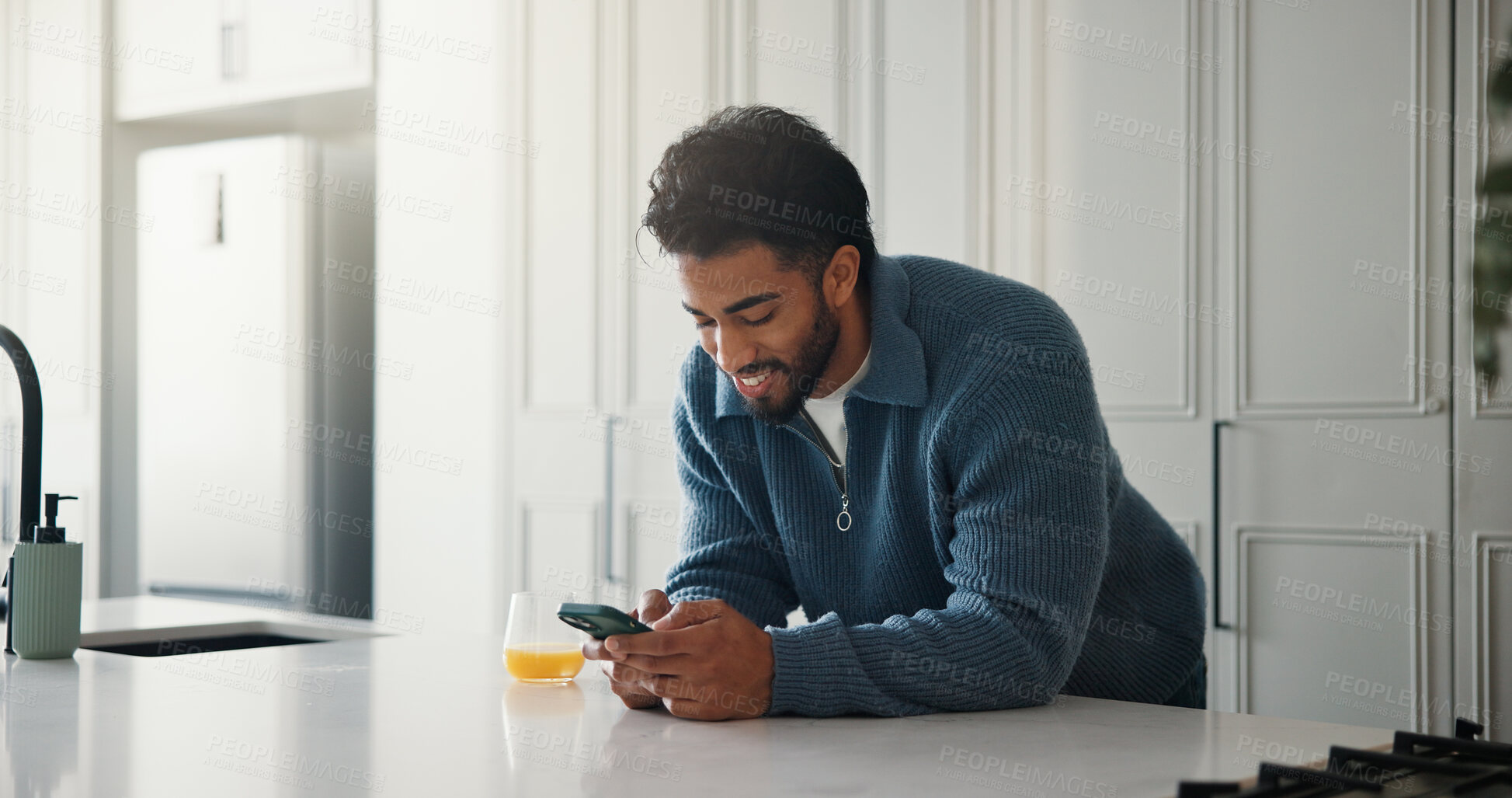 Buy stock photo Home, smartphone and man in kitchen, smile and social media with communication. Cellphone, texting and person with happiness, email notification or connection with network, online reading or internet