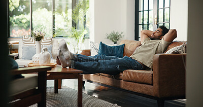 Buy stock photo Nap, relax and man on sofa with stretching, stress relief and resting on weekend break. Peaceful, sleeping and male person in house with unwind, comfortable and dreaming on Sunday afternoon.