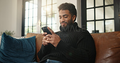 Buy stock photo Home, relax and man with cellphone, internet and social media with communication. Apartment, smartphone and person with happiness, texting and connection with network, online reading and website info