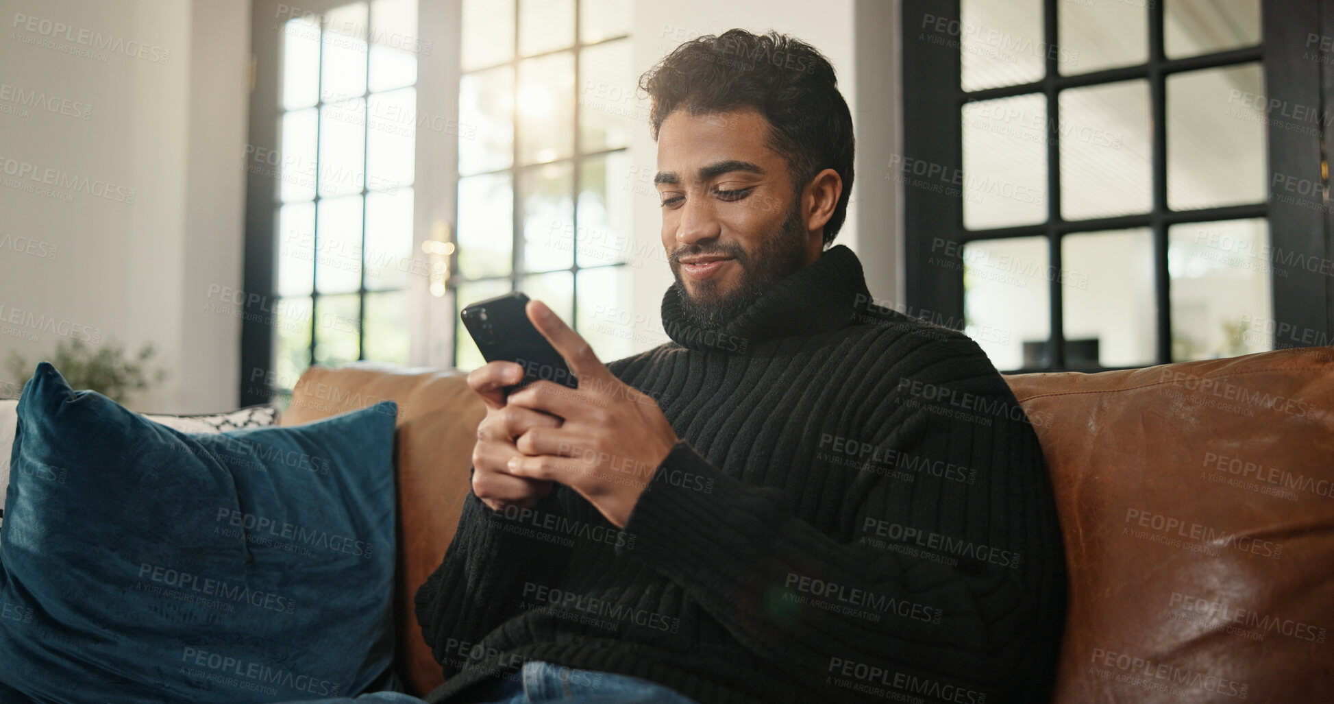 Buy stock photo Home, relax and man with cellphone, internet and social media with communication. Apartment, smartphone and person with happiness, texting and connection with network, online reading and website info